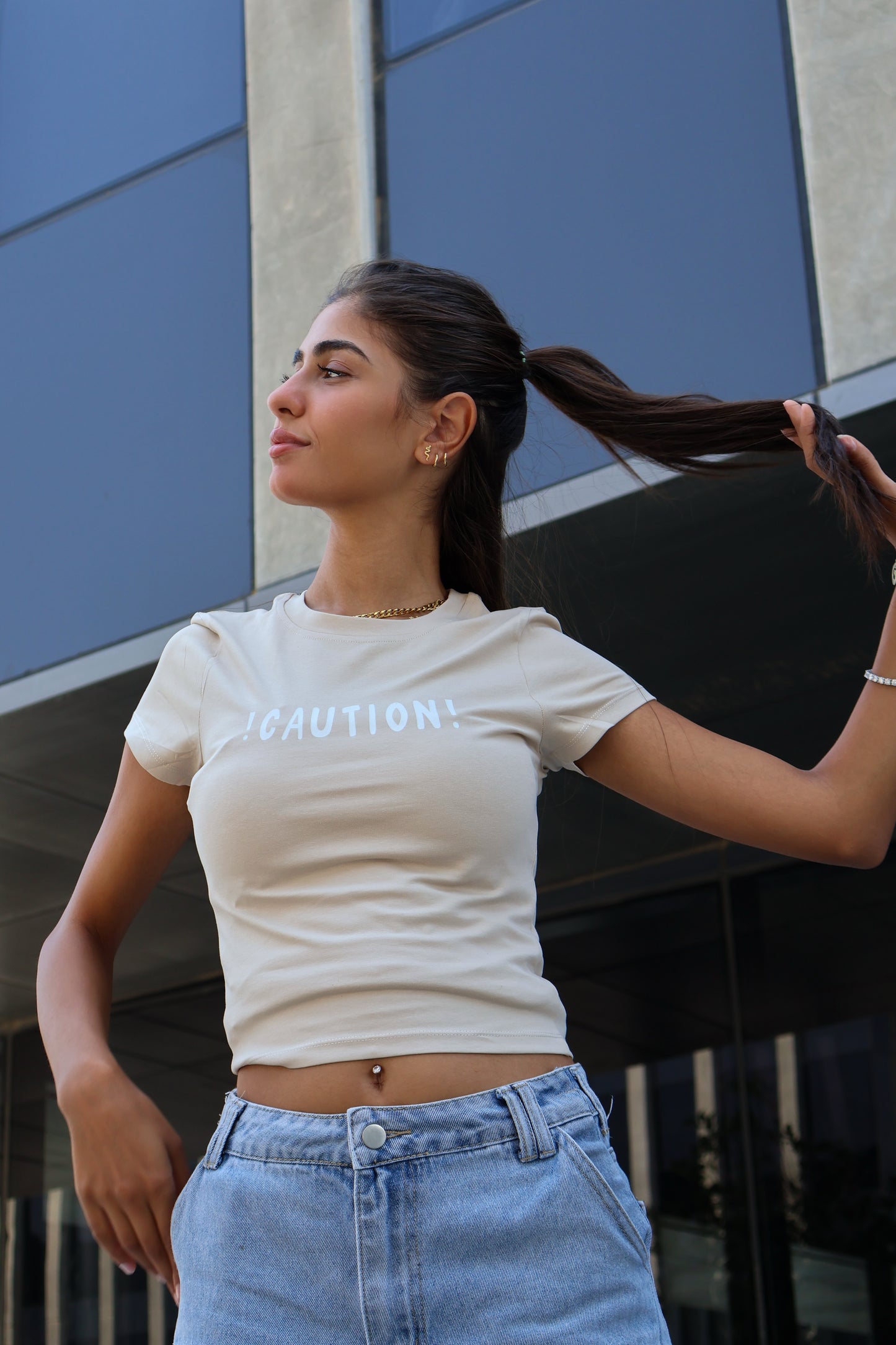 ⁠⁠Printed beige caution top